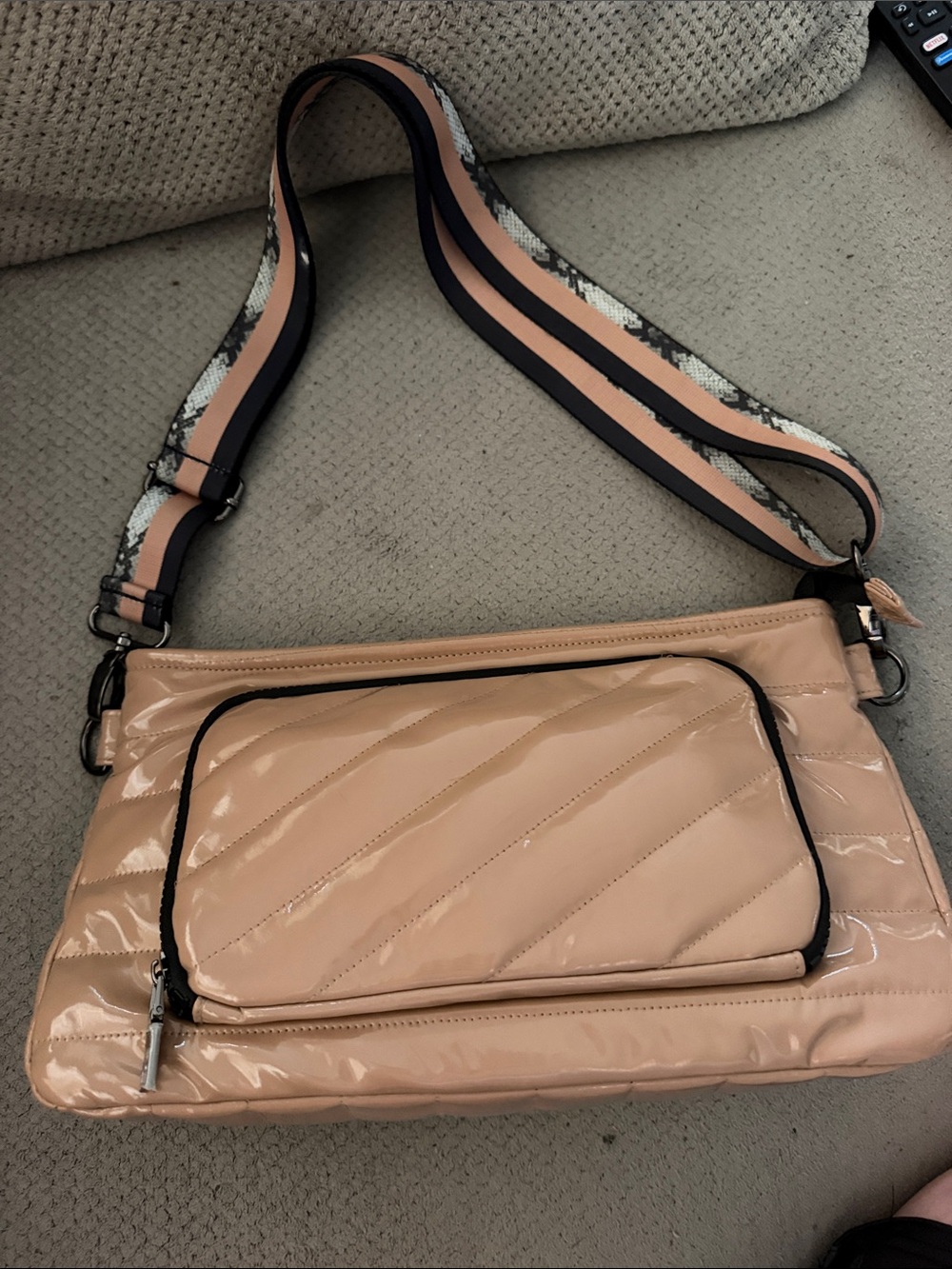 THINK ROYLN Patent Quilted Crossbody Bag in tan with Black Trim